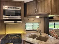 6 golf courses within 20 minutes, 30 foot camper with deck, firepit & BBQ Hotels in Horry County