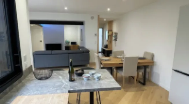 New 80 m² apartment with garden, quiet, walking distance to port, stadiums and shops