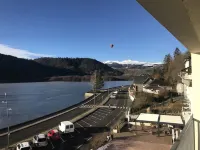 Luxury apartment with terrace on the shores of Lake Chambon overlooking Sancy
