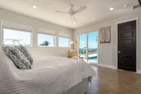 Stunning Waterfront Home! Sleeps 8 Heated Pool Hot Tub Boat Dock Chef Kitchen Hotels near Naughty Monk Brewery