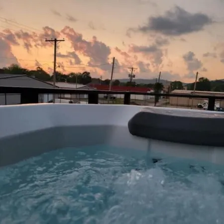 Downtown Mena apartment with hot tub and open concept
