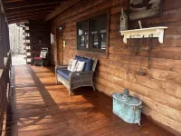 Log Cabin with Mountain Views: Hot Tub, Game Room, Fenced Yard