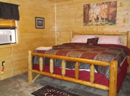 3BR 2 Bath house with full kitchen, living room, and hot tub.