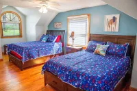 Pristine lake house offering watersports, gameroom favorites, and stunning view