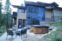 Luxurious modern SKI-IN/SKI OUT chalet.  Walk to town.  Perfect for families.