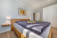 Exclusive Apartment in Central Location with Garden, Fireplace, Wlan, PS5, Fifa25, Karaoke