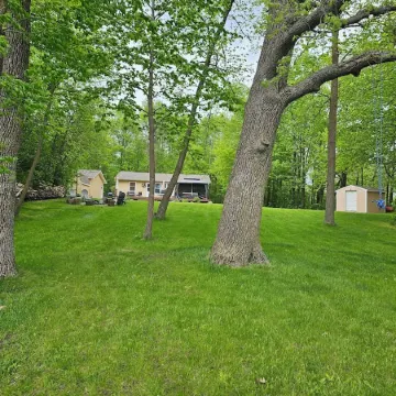 Relax in 3 bed, 2 bath house on quiet 2 acres with private lake.