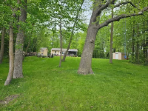 Relax in 3 bed, 2 bath house on quiet 2 acres with private lake.