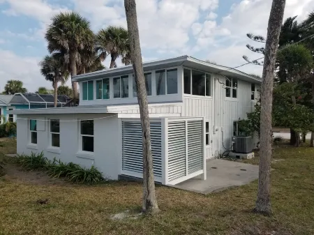 Modern Beach house with a great view, totally updated, private beach.