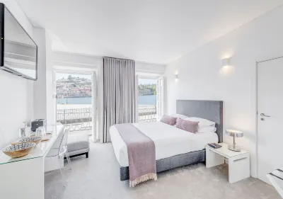Miragaia Riverside Suites.