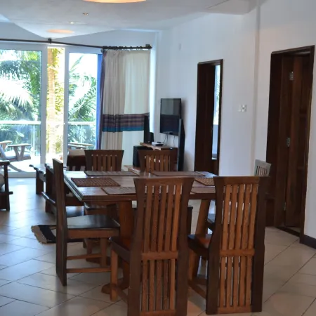 Cowrie Shell Beach Apartments Official