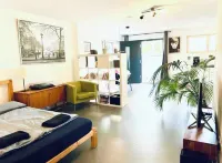 Bright basement apartment within walking distance of Wörthsee Hotels in Worthsee