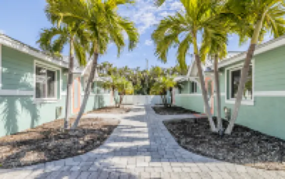 Tropical Flair and Pool Oasis - Charming Beach Getaway