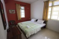 Veeniola Holiday Home فنادق في Orlim