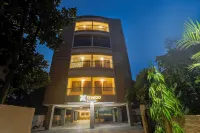 Treebo Urban Oasis Inn, Sixmile Hotels in 