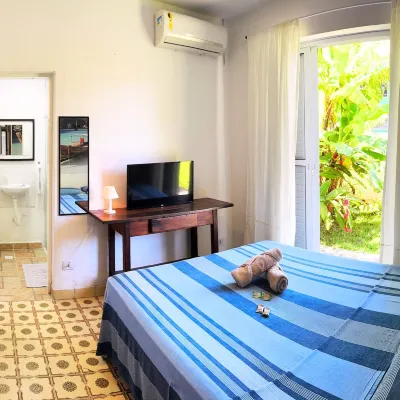 Tombo Beach Home Stay Отели рядом с достопримечательностью «Конгресс-центр Mendes»