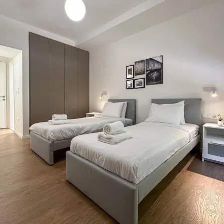 LIV - Modern Comfort Oasis in Pagrati Отели в г. Кесариани
