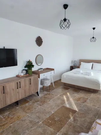 Imroz Begonvil Отели в г. Гёкчеада