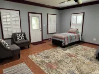 Maxinea's  Hideway is a 6 Bedroom ground level home on 3 Acres in Elberta, AL