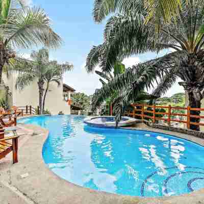 Colorful & Private 2-Bedroom Condo Just a Short Walk from the Beach Fitness & Recreational Facilities