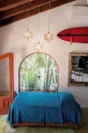 An exclusive jungle hideaway just steps from Plaza and the beach