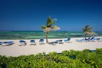 Right on the Beach! Ground Floor 2BD/2BA Condo at Castaways Cove in the East End Hotels near East End Lighthouse Park