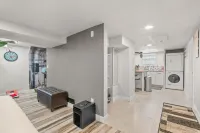 Gorgeous basement apt. w/chef kitchen, SPA bath, movie theater, hot tub & sauna