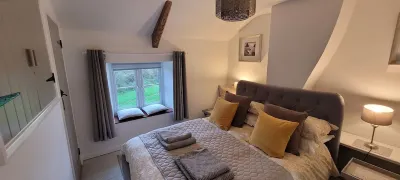 Stone cottage in idyllic location, surrounded by countryside, close to beaches.