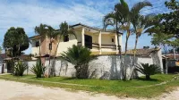 Beach house: 5 bedrooms, swimming pool, barbecue, billiards. Excellent location. Hotels in Bertioga