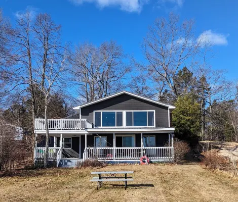 Lakefront Retreat: Escape to a SANDY Pet Friendly private Lake Huron Beach!