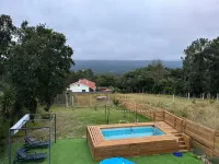 In the center of town, close to culture, the beach and the mountains. Pets accepted