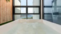 Yeosu Wellstay Pool Villa - vasca da bagno