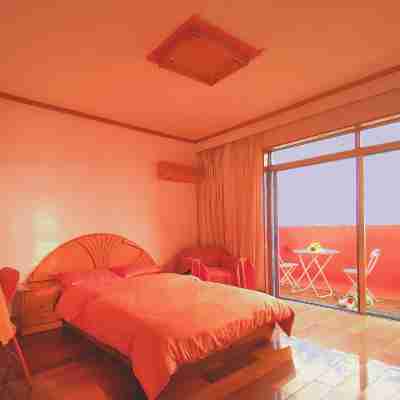 百香果甜不甜公寓(麓源路分店) Rooms