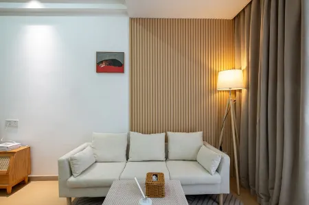 Xuzhou Squirrel Homestay (Tongshan Wanda Plaza) Отели рядом с достопримечательностью «Jiuzhou College of Vocation & Technology»