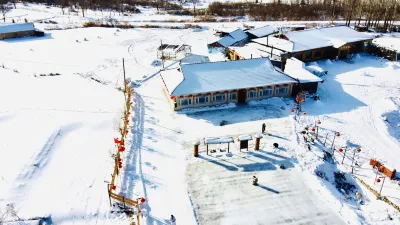 Xuegu Xiaoyun Farmhouse (Xuegu Scenic Area Branch) Hotel di Snow Town Scenic Aera