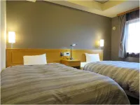 Hotel Route-Inn Kikugawa Inter Hôtels à : Omaezaki