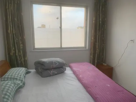 Mitou Apartment (Qingshan Road) Отели рядом с достопримечательностью «Mu'ai Square»