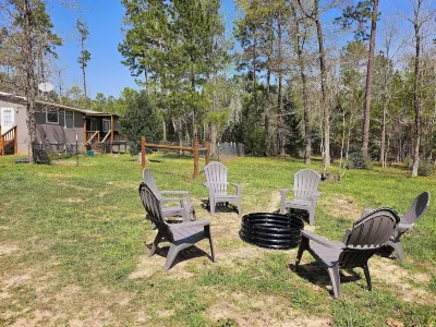 Charming, private 3-BR home in lovely Coldspring with WiFi and fenced yard.