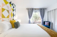 Spin Some Vinyl at a Lush Green Retreat with Two Bedrooms
