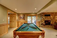 Whitefish Chain Lake Home with Beach + Sauna + King Beds + Kayaks +Paddle Boards