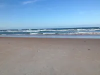 No snow here. 5 minute walk to the beach. Quiet neighborhood.