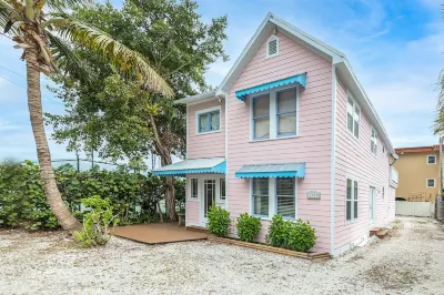 The Pink House Unit B: A Cozy Retreat Steps from the Beach