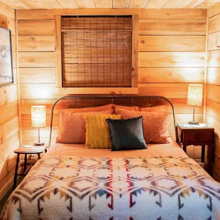 Remote cabin with creek and waterfall views 10 min from town