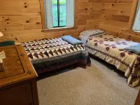 Cozy  Sebec Lake front cabin with dock and fire pit