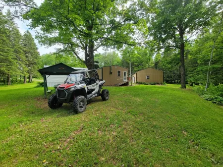 Secluded camp off the snowmobile trail