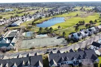 Minutes from Bethany Beach, sleeps 14, pools, golf, tennis beach shuttle & more