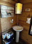 Buckeye cabin is nestled in the woods with access to the Little Missouri River.
