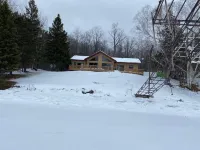 Lake home with UTV/Snow trails located at mailbox.