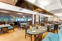 Whispering Palms Beach Resort Отели в г. Кандолим