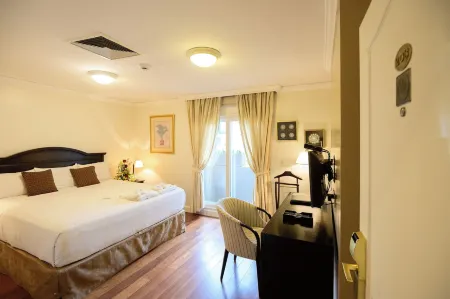 Hotel Villa Morra Suites Отели рядом с достопримечательностью «Ботанический сад Асунсьона»